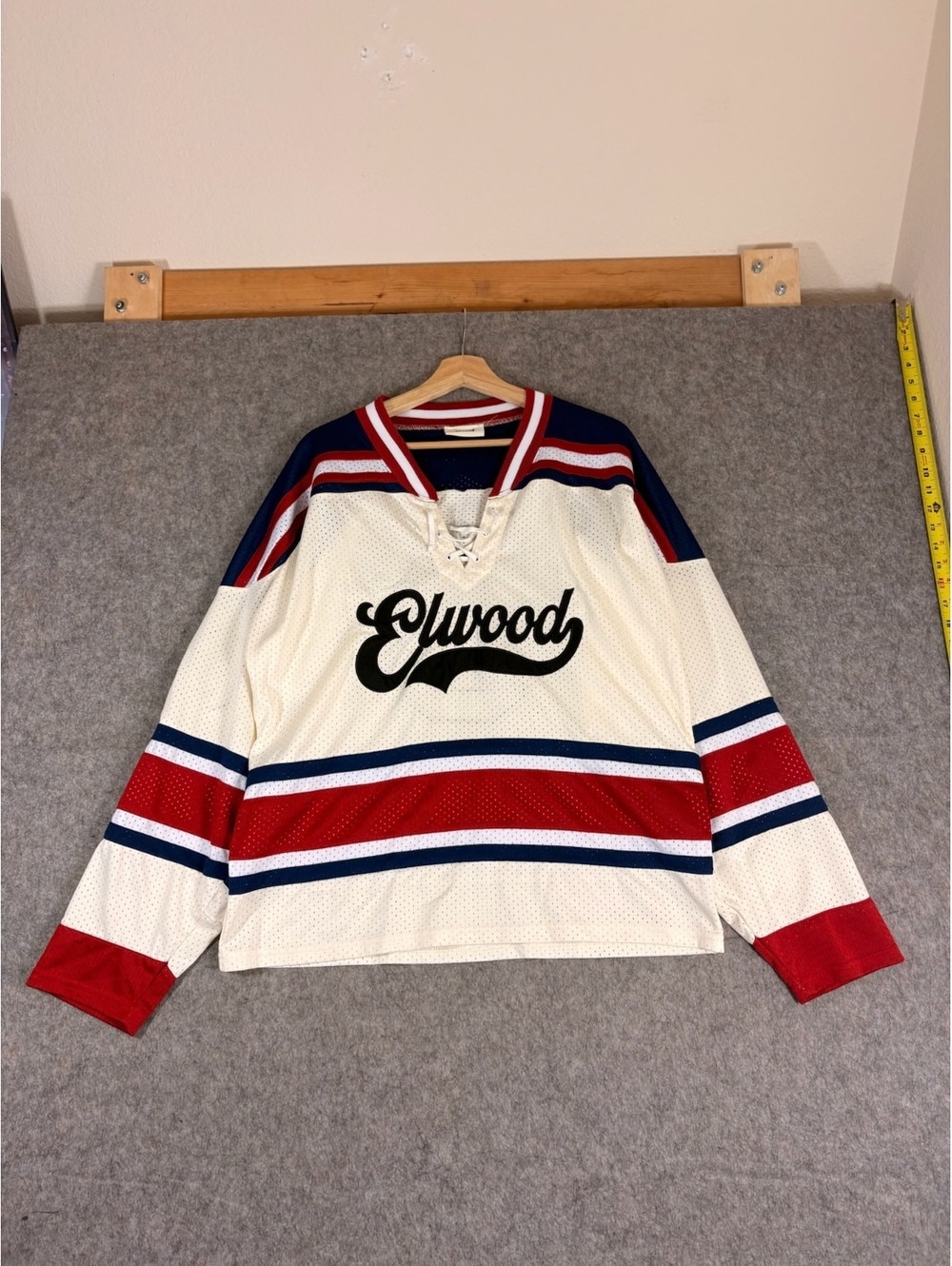 Elwood white red and blue hockey jersey size Xl/2XL